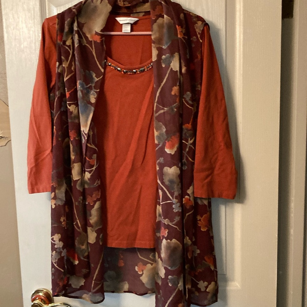 Selling as set-think tunic’s soft surroundings and top is Christopher &Banks